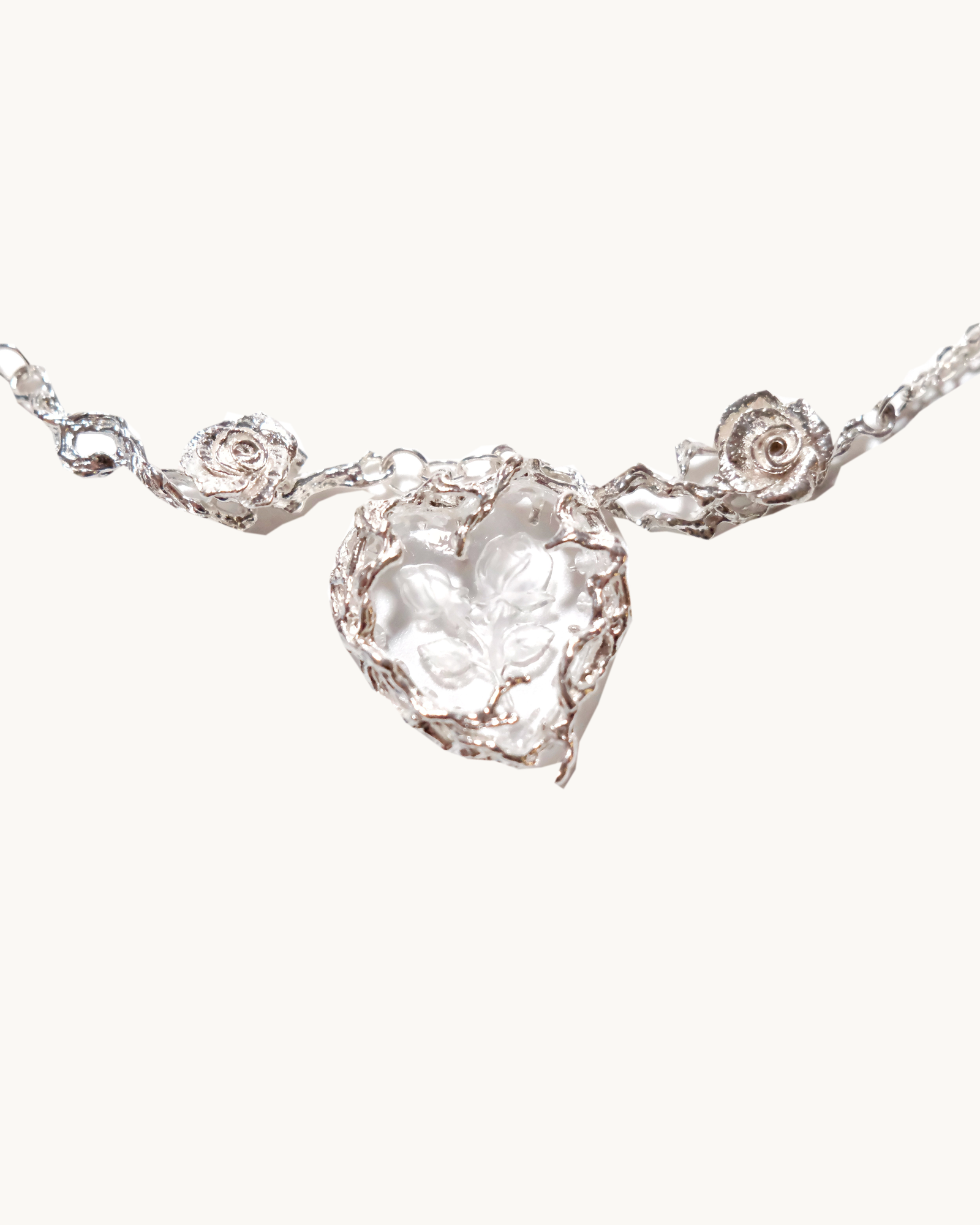 PlantsSorcery Engraved Glass Necklace detail on ivory background